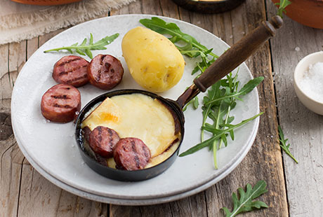 Raclette de Brézain aux saucisses fumées